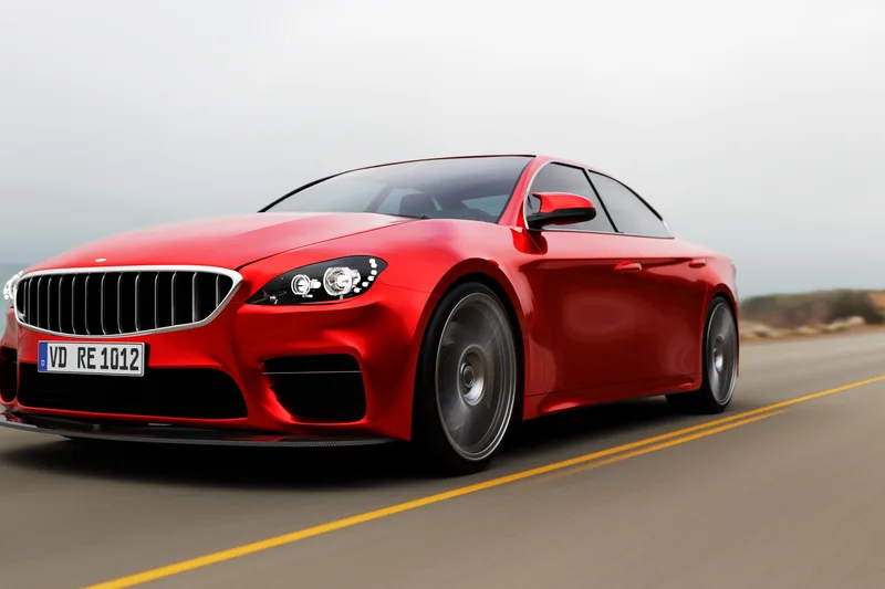 A black luxury sedan in motion on the highway toward the airport