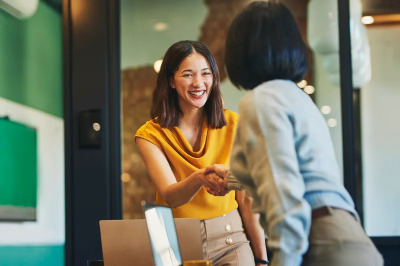 A corporate account handshake