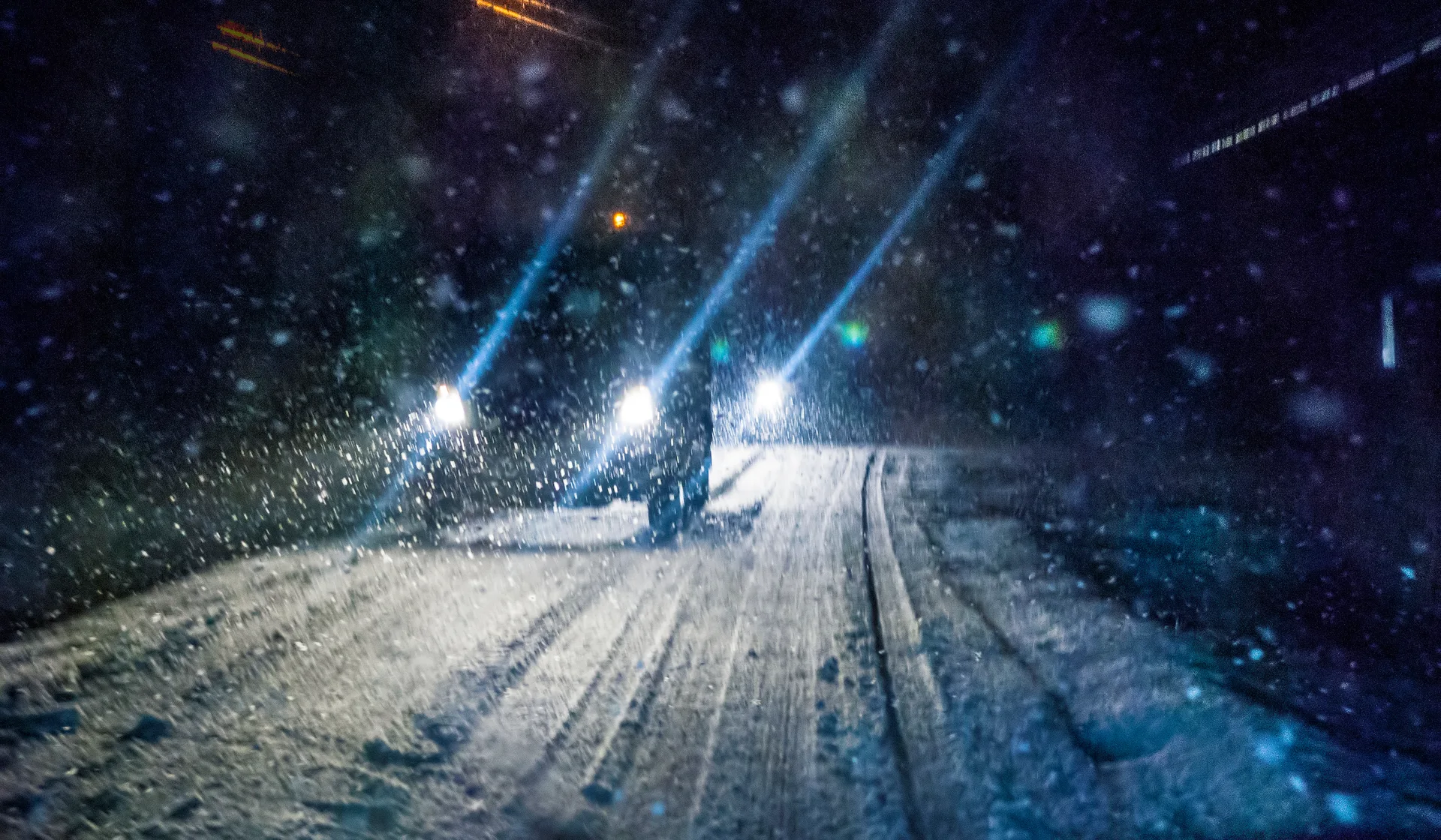 A car on a snowy winter road